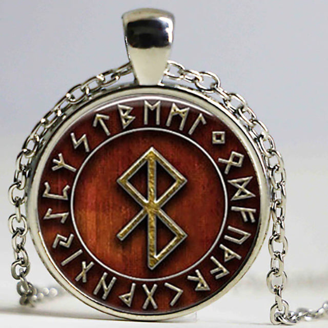 Vikinga amulett röd/metall 1087